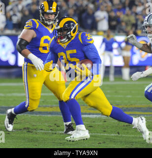 Los Angeles Rams running back C.J. Anderson runs for a gain against the Dallas Cowboys in their divisional-round playoff game at The Coliseum in Los Angeles, California on January 12, 2019. Photo by Lori Shepler/UPI Stock Photo