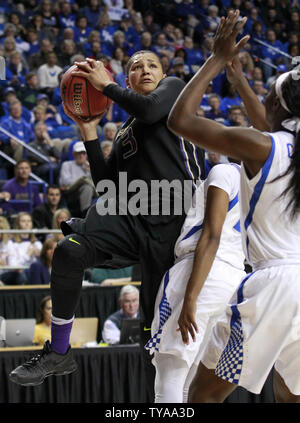 Washington Huskies' Talia Walton (3) fights to get her shot off under pressure from Kentucky Wildcats' Taylor Murry (24) during the second half of play in their regional semifinal game of 2016 NCAA Division I Women's Basketball Championship at Rupp Arena in Lexington, Kentucky, March 25, 2016.           .Photo by John Sommers II/UPI Stock Photo