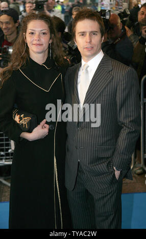 American actor Sam Rockwell and his wife arrive at the world premiere of his new film 'The Hitchhiker's Guide to the Galaxy' in London on  April 20,  2005.     (UPI Photo/Hugo Philpott) Stock Photo