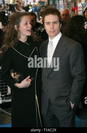 American actor Sam Rockwell and his wife arrive at the world premiere of his new film 'The Hitchhiker's Guide to the Galaxy' in London on  April 20,  2005.     (UPI Photo/Hugo Philpott) Stock Photo
