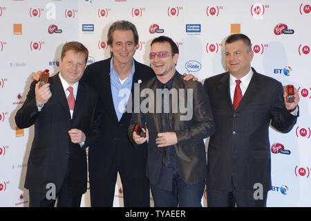 Bono,the lead singer of Irish group U2, attends a photocall for Product Red 's new Motoslvr phone which is created to help eliminate AIDS in Africa at Carphone Warehouse in London on May 15,2006. (UPI Photo/Rune Hellestad) Stock Photo