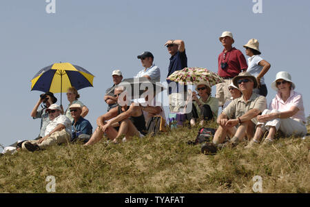 Golf fans enjoy the weather during the practice round at the 135th Open Championship in Liverpool on July 18, 2006. (UPI Photo/Hugo Philpott) Stock Photo