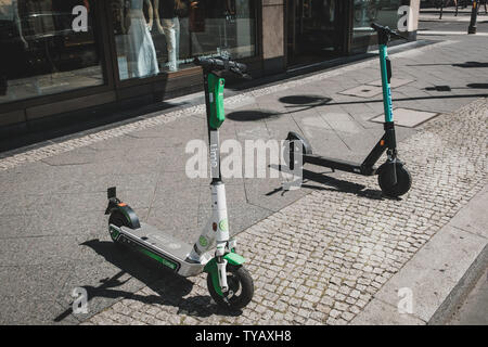 Berlin, Germany - June, 2019: Electric scooter , escooter or e-scooter on sidewalk in Berlin, Germany Stock Photo