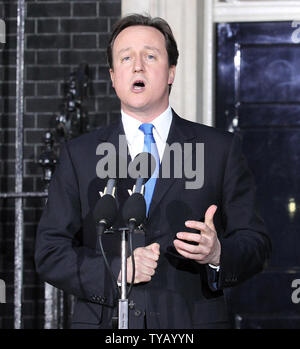 David Cameron speaks to the media outside No.10 Downing St after becoming Britain's Prime Minister following Gordon Brown's resignation this evening in London on May 10 2010.The Conservatives will be running the contry in a coalition government with the Liberal Democrats.   UPI/Hugo Philpott Stock Photo