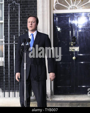 David Cameron speaks to the media outside No.10 Downing St after becoming Britain's Prime Minister following Gordon Brown's resignation this evening in London on May 10 2010.The Conservatives will be running the contry in a coalition government with the Liberal Democrats.   UPI/Hugo Philpott Stock Photo