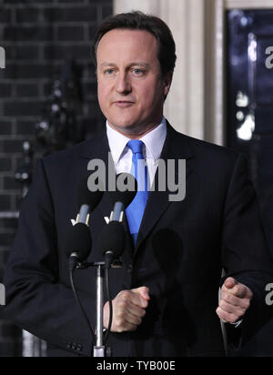 David Cameron speaks to the media outside No.10 Downing St after becoming Britain's Prime Minister following Gordon Brown's resignation this evening in London on May 10 2010.The Conservatives will be running the contry in a coalition government with the Liberal Democrats.   UPI/Hugo Philpott Stock Photo