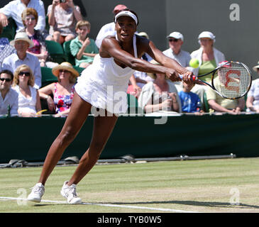 Amerivcan Venus Williams strtches for a backhand in her match with Australian's Jamila Groth on the seventh day of the Wimbledon championships in Wimbledon on June 28, 2010.Williams beat Groth 6-4,7-6.  UPI/Hugo Philpott Stock Photo