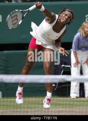 American Serena Williams serves in the Wimbledon Ladies singles final against Russian Vera Zvonareva in the Wimbledon championships in Wimbledon on July 3, 2010.Williams beat Zvonareva 6-3,6-2.   UPI/Hugo Philpott Stock Photo