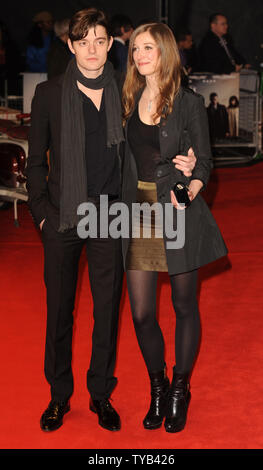 British actor Sam Riley and German actress Alexandra Maria Lara attend the European premiere of 'Brighton Rock' at Odeon West End, Leicester Square in London on February 1, 2011.     UPI/Rune Hellestad Stock Photo