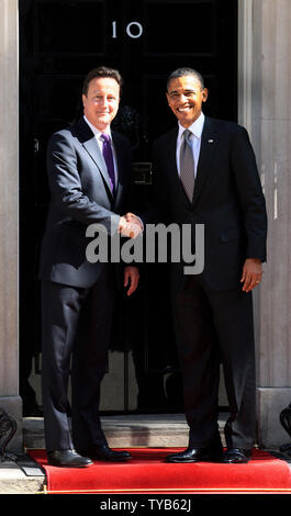 British Prime Minister David Cameron shakes the hand of US President Barack Obama on the steps of No.10 Downing St during a three day state visit to the United Kingdom in London on Wednesday May 25 2011.   UPI/Hugo Philpott. Stock Photo