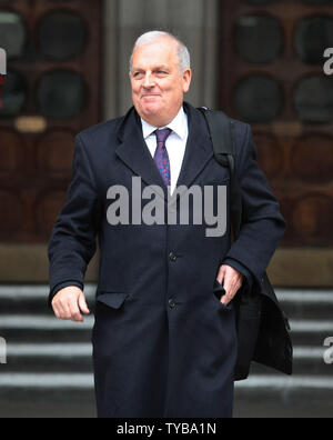Former Editor of the British tabloid newspaper 'The Sun' Kelvin Mackenzie leaves the Royal Courts of Justice after giving evidence at the Leveson Inquiry in London on Monday, January 09 2012. The Leveson Inquiry continues to look into the standards of the British Press and phone hacking practices which forced the closure of the 'News of the World.     UPI/Hugo Philpott Stock Photo