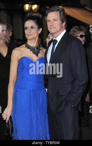 English actor Colin Firth and his Italian film producer wife Livia Giuggioli attend the premiere of 'Crossfire Hurricane' during The 56th BFI London Film Festival, The Odeon Leicester Square in London on October 18, 2012.     UPI/Paul Treadway.. Stock Photo