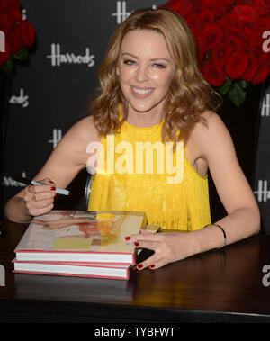 Australian singer/ actress Kylie Minogue attends a photo call for her new book  'Kylie/ Fashion' at Harrods in London on November 28, 2012.     UPI/Rune Hellestad Stock Photo