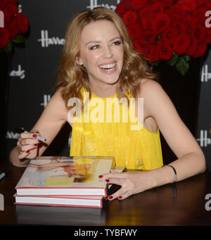 Australian singer/ actress Kylie Minogue attends a photo call for her new book  'Kylie/ Fashion' at Harrods in London on November 28, 2012.     UPI/Rune Hellestad Stock Photo