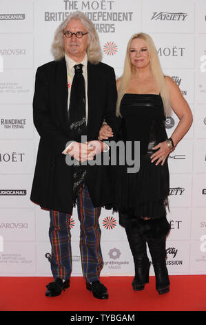 Scottish comedian and actor Billy Connolly and New Zealand clinical psychologist and writer Pamela Stephenson Connolly attend The 15th Moet British Independent Film Awards at Old Billingsgate in London on December 9, 2012.     UPI/Paul Treadway Stock Photo