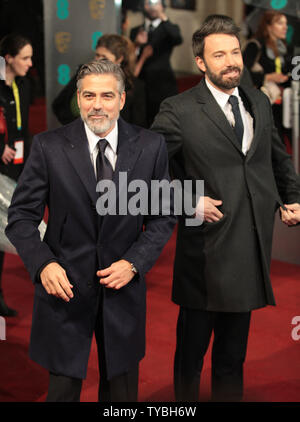 American actor Ben Affleck and George Clooney arrive at the Baftas Awards Ceremony at The Royal Opera House, London on February 10, 2013.        UPI/Hugo Philpott Stock Photo