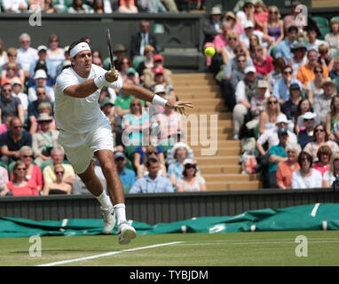 Argentine Juan Martin Del Potro returns in his match against Canadian Jesse Levine on day four of the 2013 Wimbledon Championships in London on June 27, 2013.       UPI/Hugo Philpott Stock Photo