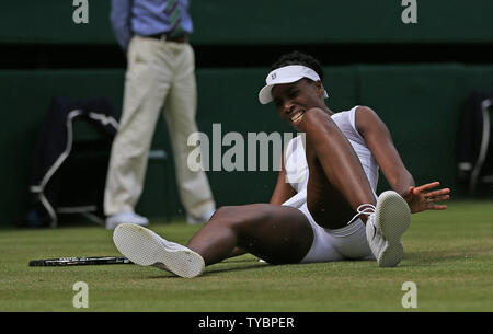 American Venus Williams falls in her match against Czech Petra Kvitova ...