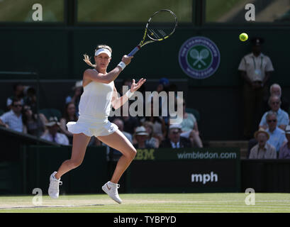 Canada's Eugenie Bouchard returns the ball in her match against Romania's Simona Halep on Ladies Semi-Finals day at the 2014 Wimbledon Championships in London on July 03, 2014. Bouchard won the match 7-6, 6-2.   UPI/Hugo Philpott Stock Photo
