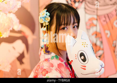 Pink cherry blossom kimono portrait. Stock Photo