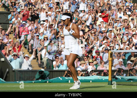 Great Britain's Heather Watson reacts during her match against American Serena Williams on day five of the 2015 Wimbledon championships, London on July 03, 2015. Williams won the match 6-2, 4-6, 7-5.     Photo by Hugo Philpott/UPI. Stock Photo