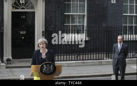 Newly appointed British Prime Minister Teresa May enters No.10 Downing St accompanied by her husband to talk to the international media in Westminster, London July 13, 2016.       Photo by Hugo Philpott/UPI Stock Photo
