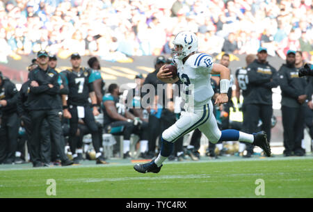 Indianapolis Colts Quaterback Andrew Luck runs with the football in their match against the Jacksonville Jaguars at Wembley Stadium, London on October 02, 2016.Jaguars won the match by 30-27.      Photo by Hugo Philpott/UPI. Stock Photo