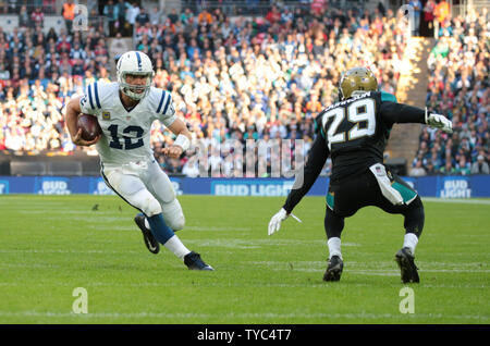 Indianapolis Colts Quaterback Andrew Luck runs with the football in their match against the Jacksonville Jaguars at Wembley Stadium, London on October 02, 2016.Jaguars won the match by 30-27.      Photo by Hugo Philpott/UPI. Stock Photo