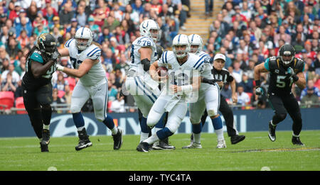 Indianapolis Colts Quaterback Andrew Luck runs with the football in their match against the Jacksonville Jaguars at Wembley Stadium, London on October 02, 2016.Jaguars won the match by 30-27.      Photo by Hugo Philpott/UPI. Stock Photo