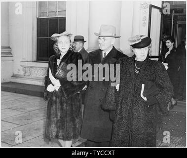 Photograph of Harry S. Truman, his wife Bess, and their daughter Margaret at the White House for the 1945 Inaugural ceremony, during which Truman was sworn in as Vice President. Stock Photo