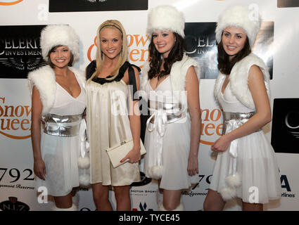 Former Miss USA and TV actress Tara Conner, second left, poses with the Snow Queen Vodka girls at the first annual Derby Spectacular at the Frazier International History Museum in Louisville, KY., on May 2, 2008. (UPI Photo/Frank Polich) Stock Photo