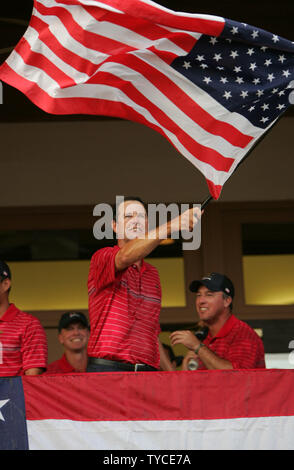 Team USA captain Paul Azinger waves a flag on the balcony of the clubhouse after defeating team Europe 16 1/2 to 11 1/2 to win the Ryder Cup at the Valhalla Golf Club in Louisville, Kentucky on September 21, 2008.  (UPI Photo/Mark Cowan) Stock Photo