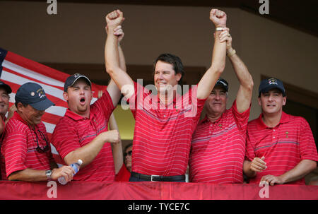 Team USA captain Paul Azinger, center, is cheered on by the crowd after defeating team Europe to win the Ryder Cup at the Valhalla Golf Club in Louisville, Kentucky on September 21, 2008. Team USA defeated team Europe 16 1/2 to 11 1/2 to take the cup for the first time since 1999. (UPI Photo/Mark Cowan) Stock Photo