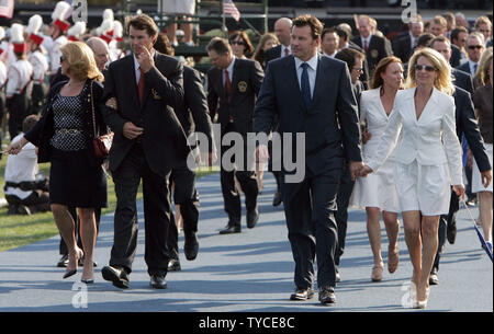 US team captain Paul Azinger with wife Toni, left, and and European team Captain Nick Faldo with wife Valerie, right, leave the opening ceremony of the Ryder Cup at the Valhalla Golf Club in Louisville on September 18, 2008.  (UPI Photo/Mark Cowan) Stock Photo