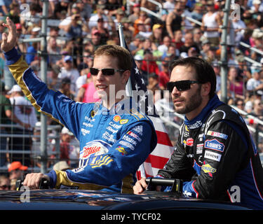 Brad Keselowski (L) and Jimmie Johnson(R) during driver introductions before the start of the NASCAR Sprint Cup Series Sylvania 300 at New Hampshire Motor Speedway in Loudon, New Hampshire on September 25, 2011.  UPI/Malcolm Hope Stock Photo