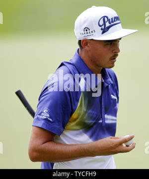 Ricky Fowler, of the United States, walks off the fourth green during the third round of the 96th PGA Championship at Valhalla Country Club on .August 9, 2014 in Louisville, Kentucky. Day shot four under par 67 and trails leader Rory McIlroy by two strokes entering Sunday's final round.     UPI/Frank Polich Stock Photo