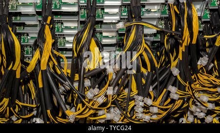 Stack of power cables from power supply unit Bitcoin Pc motherboard power cables and connectors Stock Photo