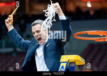 Virginia Cavaliers head coach Tony Bennett celebrates after cutting down the net after the regional final of 2019 NCAA Division I Men's Basketball tournament played against the Purdue Boilermakers at the KFC Yum Center in Louisville, Kentucky, March 30, 2019. Virginia defeated Purdue 80-75 in overtime to win the South Regional Championship.    Photo by Bryan Woolston/UPI Stock Photo