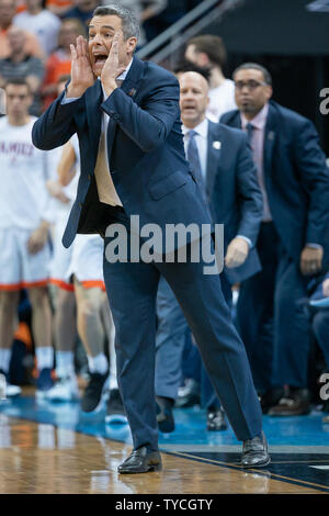 Virginia Cavaliers head coach Tony Bennett shouts to his team during the regional final of 2019 NCAA Division I Men's Basketball tournament against the Purdue Boilermakers at the KFC Yum Center in Louisville, Kentucky, March 30, 2019.     Photo by Bryan Woolston/UPI Stock Photo