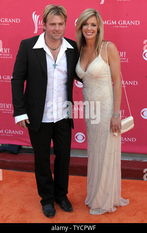 Singer Andy Griggs (L) and wife Renee Griggs arrive for the 43rd ...