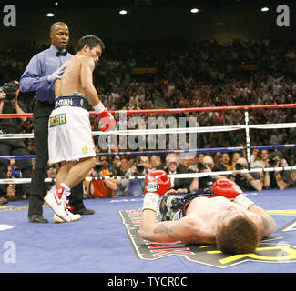 Ricky Hatton of Manchester, England is knocked out by Manny Pacquiao of the Philippines at 2 minutes 59 seconds of the second round ending their fight at the MGM Grand in Las Vegas on May 2, 2009.   (UPI Photo/Roger Williams) Stock Photo