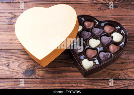 Chocolate in the shape of hearts on the table. Valentines day gift, romantic Stock Photo