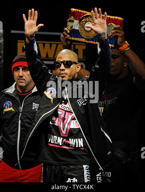 Miguel Cotto, Of Puerto Rico, Is On His Knees After A Knock Down By ...