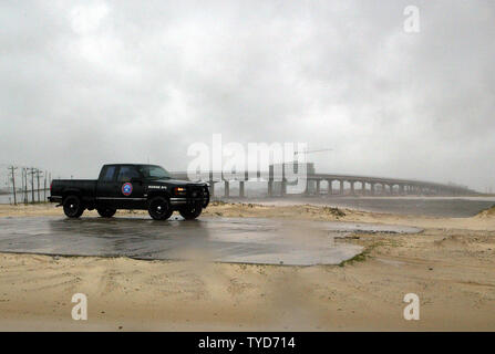 A police truck patrols Orange Beach, Alabama as Hurricane Dennis make landfall July 10, 2005. Hurricane Dennis reintensified over the warm Gulf of Mexico after killing dozens of people in the Caribbean.   (UPI Photo/A.J. Sisco) Stock Photo