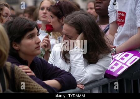 Supporters of Segolene Royal, socialist candidate in France's presidential elections, react after the announcement of the elections results in Paris, May 6, 2007. Royal lost to conservative Nicolas Sarkozy. (UPI Photo/Khanh Renaud) Stock Photo