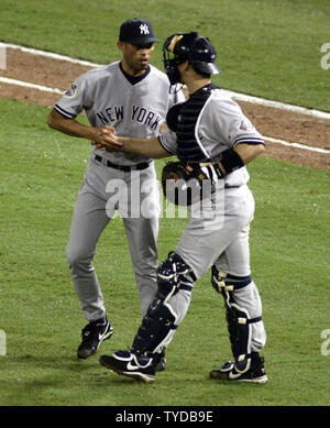 New York Yankees catcher Jorge Posada tags out Florida Marlins