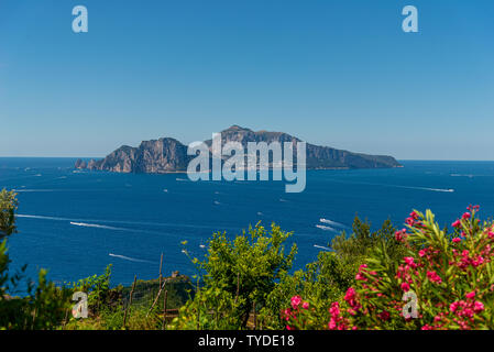 Landscape depicting the Capri Island framed by sea and sky, taken on a summer day from Massa Lubrense near Sorrento Stock Photo