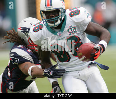 November 20, 2022: New England Patriots safety Kyle Dugger (23) tackles New  York Jets running back Michael Carter (32) during the second half in  Foxborough, Massachusetts. Eric Canha/CSM/Sipa USA(Credit Image: © Eric