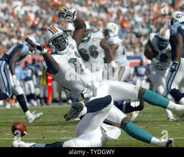 Miami Dolphins tightend Randy McMichael gains yardages against the  Tenneessee Titans December 24, at Dolphins Stadium in Miami Fl. The Miami  Dolphins beat the Tennessee Titans 24-10. (UPI PHOTO/Susan Knowles Stock  Photo 