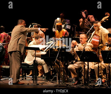 Wynton Marsalis performs with, and conducts the Lincoln Center Jazz Orchestra at the Jackie Gleason Theater in Miami Beach, Florida on April 25, 2006. (UPI Photo/Michael Bush) Stock Photo